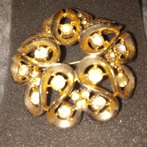 Large gold plated with crystals brooch